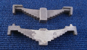 <span>TWO Dummy Leaf Springs - Cast Iron,190mm ovrl width, 20mm thick, 40 x 20mm centre buckle- can be drilled to take a coil spring, 7 1/4"g - 10 1/4" g.